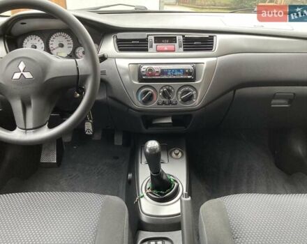 Сірий Міцубісі Lancer, об'ємом двигуна 1.59 л та пробігом 44 тис. км за 6200 $, фото 2 на Automoto.ua
