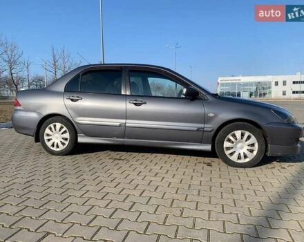 Серый Мицубиси Лансер, объемом двигателя 1.6 л и пробегом 260 тыс. км за 3950 $, фото 3 на Automoto.ua