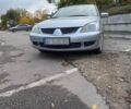 Серый Мицубиси Лансер, объемом двигателя 1.6 л и пробегом 235 тыс. км за 2550 $, фото 1 на Automoto.ua