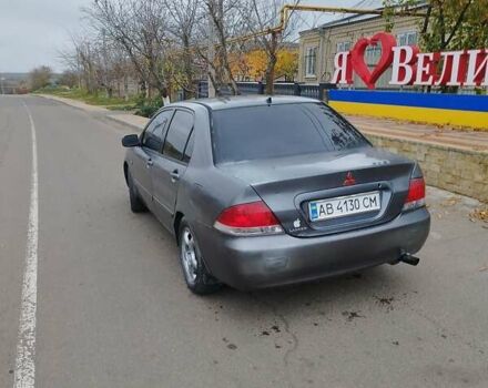Серый Мицубиси Лансер, объемом двигателя 1.6 л и пробегом 250 тыс. км за 3800 $, фото 3 на Automoto.ua