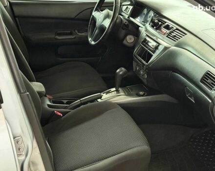 Серый Мицубиси Лансер, объемом двигателя 1.6 л и пробегом 174 тыс. км за 5990 $, фото 11 на Automoto.ua