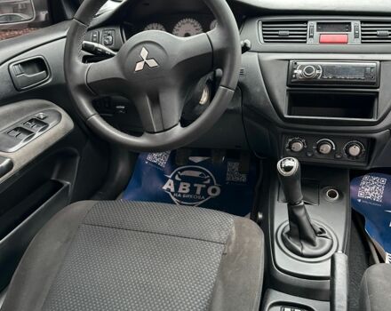 Серый Мицубиси Лансер, объемом двигателя 1.6 л и пробегом 280 тыс. км за 4600 $, фото 3 на Automoto.ua
