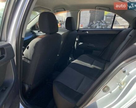 Серый Мицубиси Лансер, объемом двигателя 2 л и пробегом 150 тыс. км за 6100 $, фото 12 на Automoto.ua