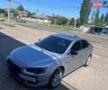 Серый Мицубиси Лансер, объемом двигателя 2 л и пробегом 288 тыс. км за 6100 $, фото 1 на Automoto.ua