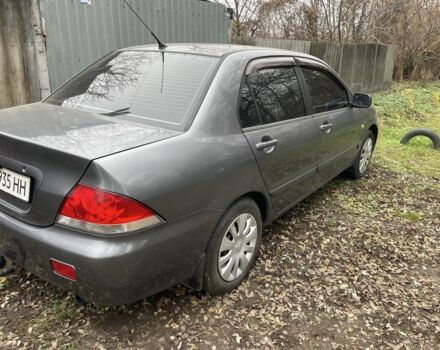 Сірий Міцубісі Lancer, об'ємом двигуна 1.6 л та пробігом 290 тис. км за 3600 $, фото 1 на Automoto.ua