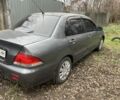Сірий Міцубісі Lancer, об'ємом двигуна 1.6 л та пробігом 290 тис. км за 3600 $, фото 1 на Automoto.ua