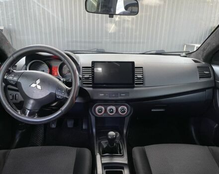 Серый Мицубиси Лансер, объемом двигателя 2 л и пробегом 244 тыс. км за 6500 $, фото 4 на Automoto.ua