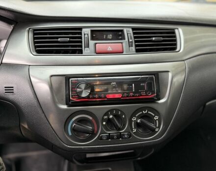 Сірий Міцубісі Lancer, об'ємом двигуна 1.6 л та пробігом 247 тис. км за 4900 $, фото 7 на Automoto.ua