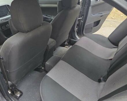 Сірий Міцубісі Lancer, об'ємом двигуна 2 л та пробігом 190 тис. км за 7100 $, фото 2 на Automoto.ua