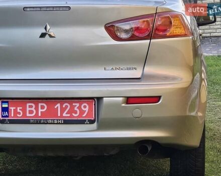 Серый Мицубиси Лансер, объемом двигателя 2 л и пробегом 282 тыс. км за 5450 $, фото 33 на Automoto.ua