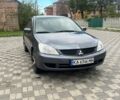 Міцубісі Lancer 2007 у Белой Церкве на Automoto.ua Сірий Міцубісі Lancer, об'ємом двигуна 1.6 л та пробігом 254 тис. км за 3200 $, фото 2 на Automoto.ua