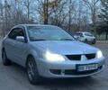 Сірий Міцубісі Lancer, об'ємом двигуна 1.6 л та пробігом 210 тис. км за 4750 $, фото 1 на Automoto.ua