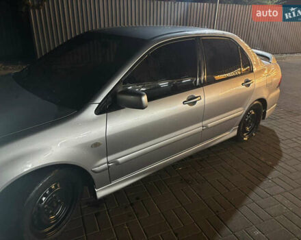 Сірий Міцубісі Lancer, об'ємом двигуна 1.6 л та пробігом 199 тис. км за 4000 $, фото 1 на Automoto.ua
