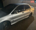 Сірий Міцубісі Lancer, об'ємом двигуна 1.6 л та пробігом 199 тис. км за 4000 $, фото 1 на Automoto.ua
