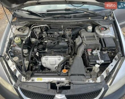 Сірий Міцубісі Lancer, об'ємом двигуна 1.58 л та пробігом 305 тис. км за 3300 $, фото 6 на Automoto.ua