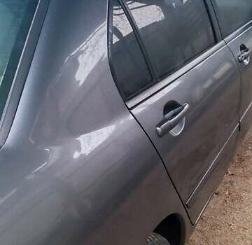 Серый Мицубиси Лансер, объемом двигателя 1.58 л и пробегом 400 тыс. км за 5000 $, фото 5 на Automoto.ua