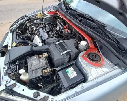 Сірий Міцубісі Lancer, об'ємом двигуна 1.58 л та пробігом 416 тис. км за 3100 $, фото 7 на Automoto.ua