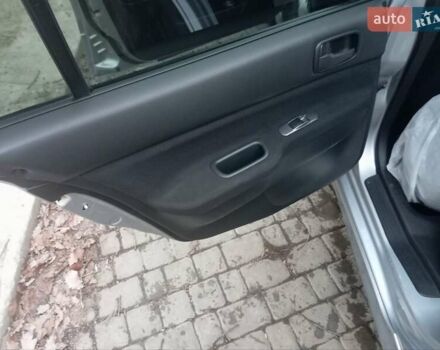 Серый Мицубиси Лансер, объемом двигателя 1.6 л и пробегом 175 тыс. км за 4200 $, фото 2 на Automoto.ua