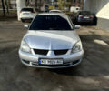 Сірий Міцубісі Lancer, об'ємом двигуна 1.6 л та пробігом 249 тис. км за 5100 $, фото 6 на Automoto.ua
