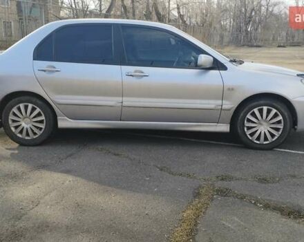 Серый Мицубиси Лансер, объемом двигателя 1.6 л и пробегом 205 тыс. км за 4500 $, фото 2 на Automoto.ua