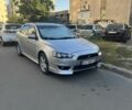Сірий Міцубісі Lancer, об'ємом двигуна 2 л та пробігом 240 тис. км за 7017 $, фото 1 на Automoto.ua