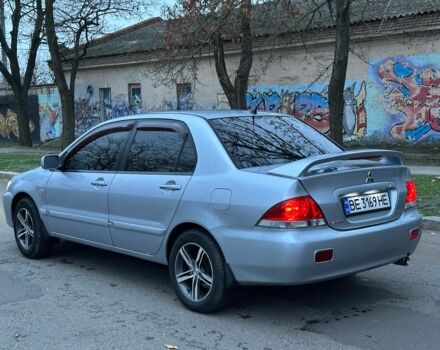 Сірий Міцубісі Lancer, об'ємом двигуна 1.6 л та пробігом 210 тис. км за 4750 $, фото 2 на Automoto.ua