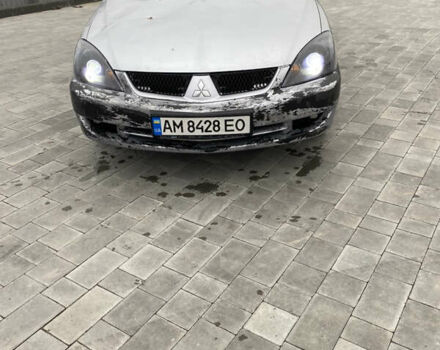 Серый Мицубиси Лансер, объемом двигателя 1.6 л и пробегом 263 тыс. км за 2350 $, фото 1 на Automoto.ua