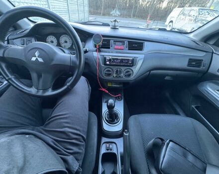 Серый Мицубиси Лансер, объемом двигателя 1.6 л и пробегом 256 тыс. км за 4500 $, фото 7 на Automoto.ua