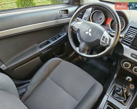 Серый Мицубиси Лансер, объемом двигателя 2 л и пробегом 282 тыс. км за 5450 $, фото 58 на Automoto.ua