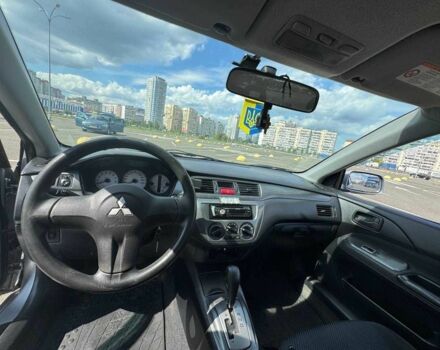 Серый Мицубиси Лансер, объемом двигателя 1.6 л и пробегом 288 тыс. км за 4500 $, фото 11 на Automoto.ua