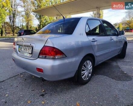 Сірий Міцубісі Lancer, об'ємом двигуна 1.58 л та пробігом 122 тис. км за 6300 $, фото 12 на Automoto.ua