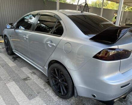 Серый Мицубиси Лансер, объемом двигателя 2 л и пробегом 244 тыс. км за 6500 $, фото 2 на Automoto.ua