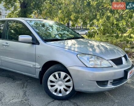 Сірий Міцубісі Lancer, об'ємом двигуна 1.58 л та пробігом 138 тис. км за 4990 $, фото 1 на Automoto.ua