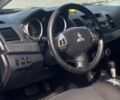 Сірий Міцубісі Lancer, об'ємом двигуна 2 л та пробігом 220 тис. км за 6600 $, фото 5 на Automoto.ua