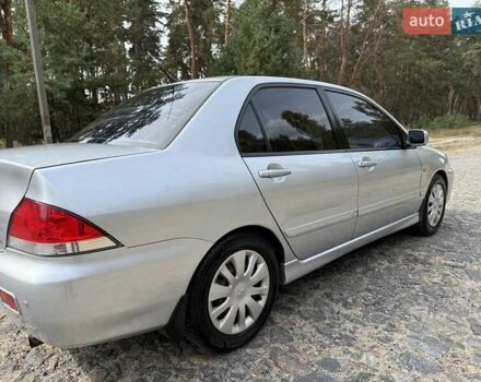 Серый Мицубиси Лансер, объемом двигателя 1.6 л и пробегом 200 тыс. км за 4400 $, фото 9 на Automoto.ua