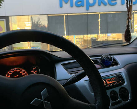 Серый Мицубиси Лансер, объемом двигателя 1.6 л и пробегом 248 тыс. км за 3000 $, фото 3 на Automoto.ua