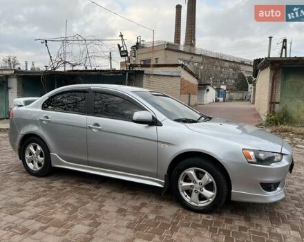 Серый Мицубиси Лансер, объемом двигателя 2 л и пробегом 180 тыс. км за 6799 $, фото 3 на Automoto.ua