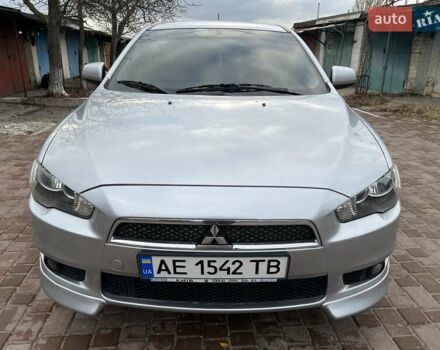 Серый Мицубиси Лансер, объемом двигателя 2 л и пробегом 180 тыс. км за 6799 $, фото 2 на Automoto.ua
