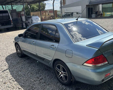 Сірий Міцубісі Lancer, об'ємом двигуна 1.58 л та пробігом 180 тис. км за 4400 $, фото 2 на Automoto.ua