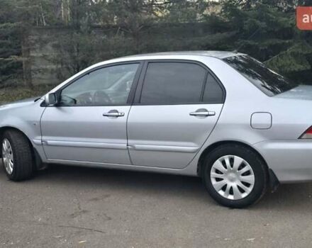 Сірий Міцубісі Lancer, об'ємом двигуна 1.6 л та пробігом 213 тис. км за 3600 $, фото 4 на Automoto.ua