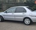 Сірий Міцубісі Lancer, об'ємом двигуна 1.6 л та пробігом 213 тис. км за 3600 $, фото 4 на Automoto.ua