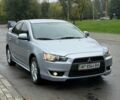 Серый Мицубиси Лансер, объемом двигателя 2 л и пробегом 32 тыс. км за 8400 $, фото 1 на Automoto.ua