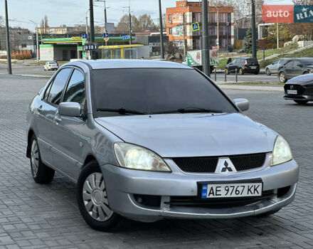 Серый Мицубиси Лансер, объемом двигателя 1.6 л и пробегом 200 тыс. км за 3900 $, фото 4 на Automoto.ua