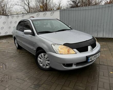 Серый Мицубиси Лансер, объемом двигателя 1.6 л и пробегом 205 тыс. км за 5300 $, фото 1 на Automoto.ua