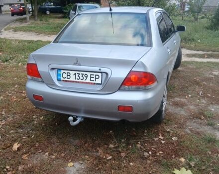 Серый Мицубиси Лансер, объемом двигателя 1.6 л и пробегом 240 тыс. км за 3500 $, фото 2 на Automoto.ua