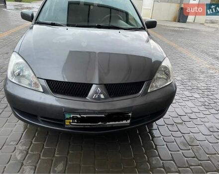 Сірий Міцубісі Lancer, об'ємом двигуна 1.6 л та пробігом 330 тис. км за 3500 $, фото 16 на Automoto.ua