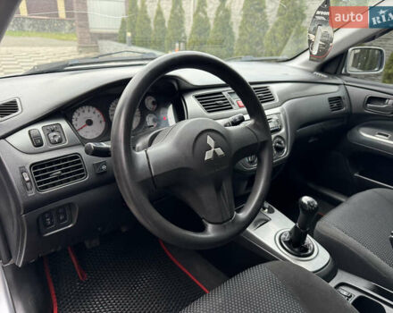 Сірий Міцубісі Lancer, об'ємом двигуна 1.6 л та пробігом 281 тис. км за 3999 $, фото 17 на Automoto.ua