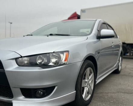 Серый Мицубиси Лансер, объемом двигателя 2 л и пробегом 286 тыс. км за 5800 $, фото 2 на Automoto.ua