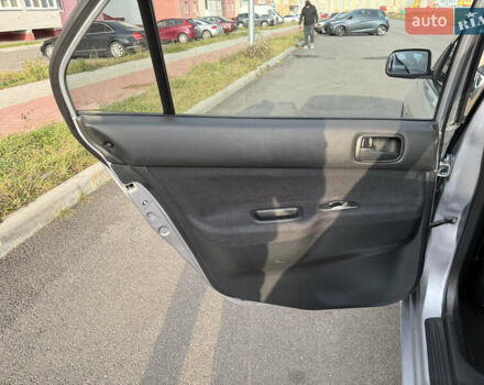 Серый Мицубиси Лансер, объемом двигателя 1.3 л и пробегом 160 тыс. км за 5555 $, фото 52 на Automoto.ua