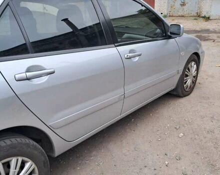 Сірий Міцубісі Lancer, об'ємом двигуна 1.6 л та пробігом 122 тис. км за 5500 $, фото 3 на Automoto.ua